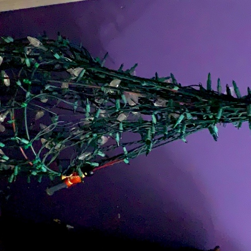 Fake metal Christmas tree with lights